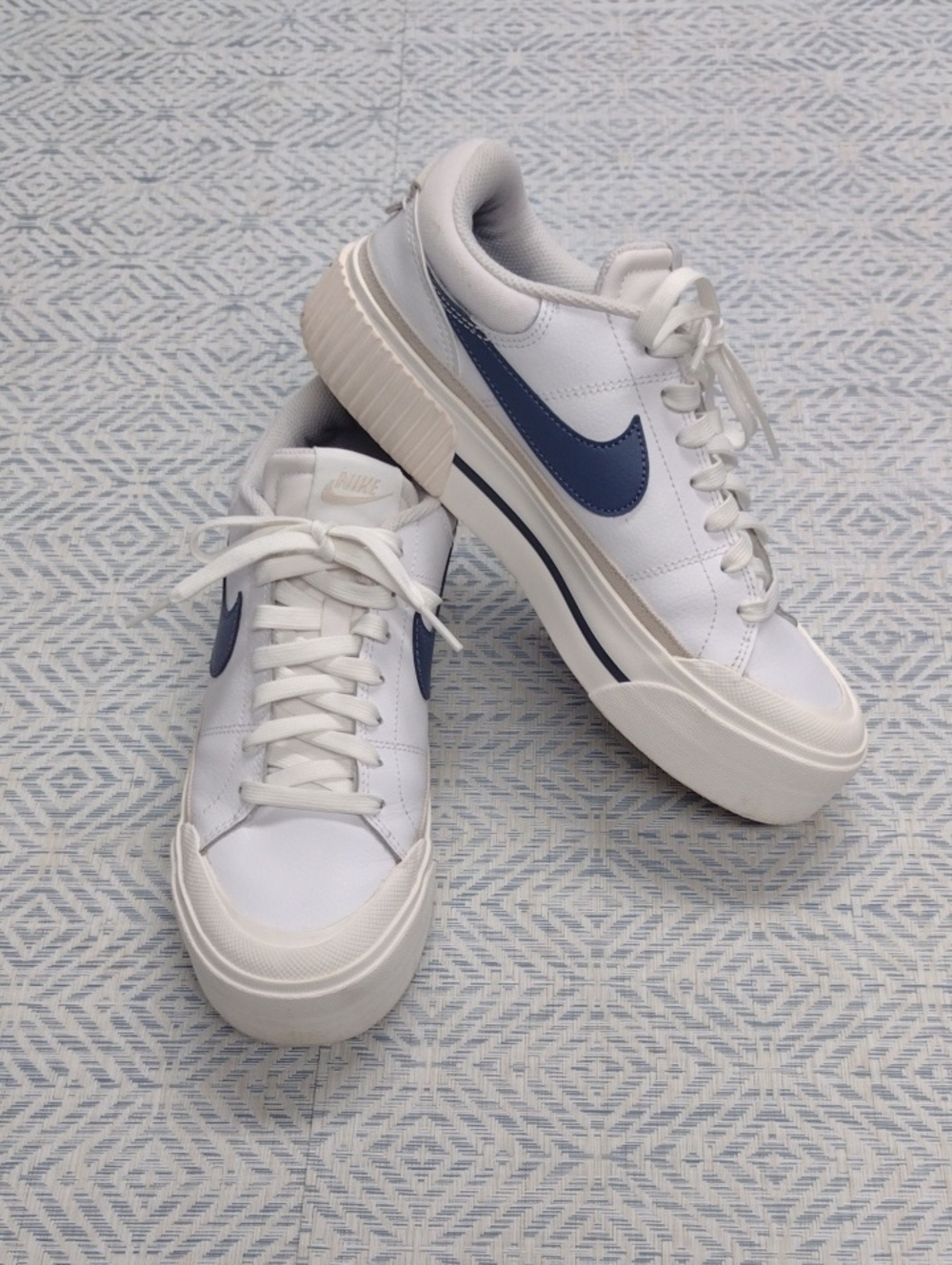 Nike White Sneakers with Navy Blue Swoosh